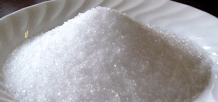 a pile of sugar on a plate