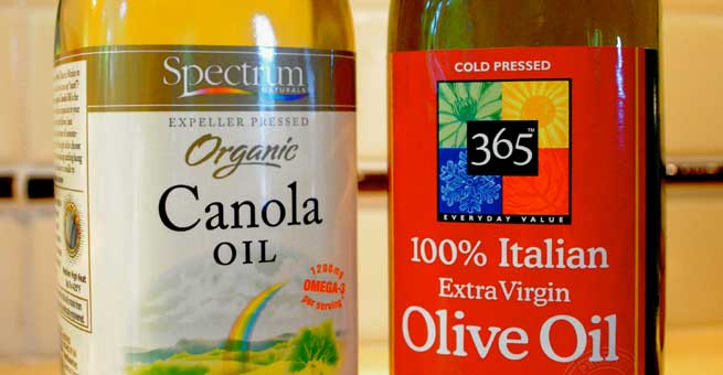 bottle of canola oil and of olive oil